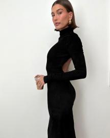 Hailey Bieber Shows Off Her Figure in a Sexy Black Backless Dress: Photos