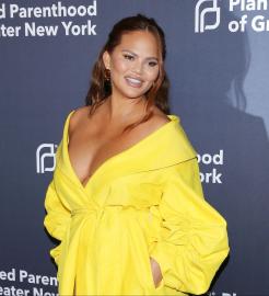 Chrissy Teigen Claps Back at Mom-Shamers Criticizing Her Baby Carrier Use