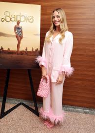 Margot Robbie Is Bedtime Barbie in Pink Feather Pajamas