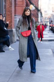 Katie Holmes Adds a Pop of Red to an Otherwise Neutral Winter Outfit