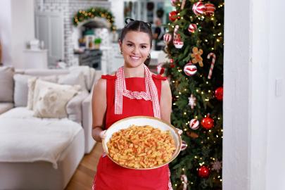 Selena Gomez Blushes After Seemingly Texting 'Cute Boys' on Cooking Special