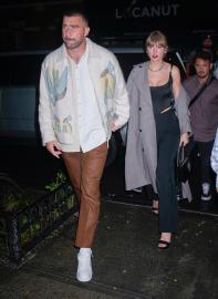 Taylor Swift and Travis Kelce Spotted at Holiday Party in Kansas City