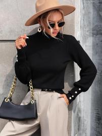 Just Dropped! Wear Style on Your Sleeves With This Button-Detail Turtleneck