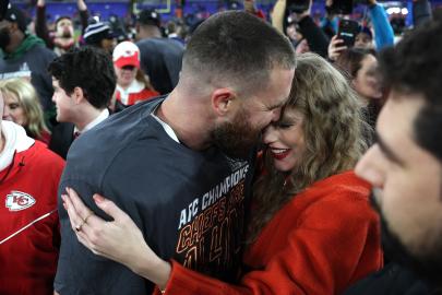 Taylor Swift Kisses Travis Kelce on the Field After AFC Championship Win