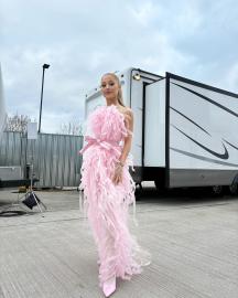 Ariana Grande Channels Her Inner Glinda in Bubble Gum Pink Ribbon Dress