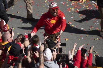 Travis Kelce Chugs Beer With Cardboard Cutout of Jason at Chiefs Parade