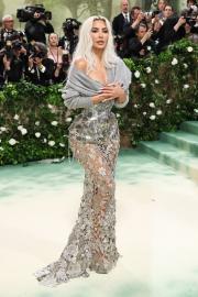 Kim Kardashian's Met Gala Shoes Had No Heel: ‘Gotta Do What We Gotta Do’
