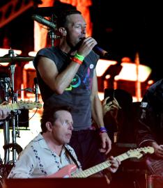 Michael J. Fox Performs With Coldplay on Stage at Glastonbury