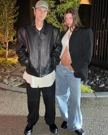 Justin Bieber Kisses Pregnant Wife Hailey While Cradling Her Baby Bump