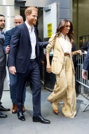 Prince Harry and Meghan Markle Cuddle Up at Beyonce's L.A Concert