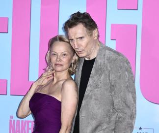 Pamela Anderson Hints It's Hard Not to 'Fall in Love' With Liam Neeson