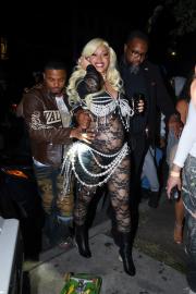 Cardi B Flaunts Baby Bump in Sheer Lace Catsuit and Pearls at Album Event